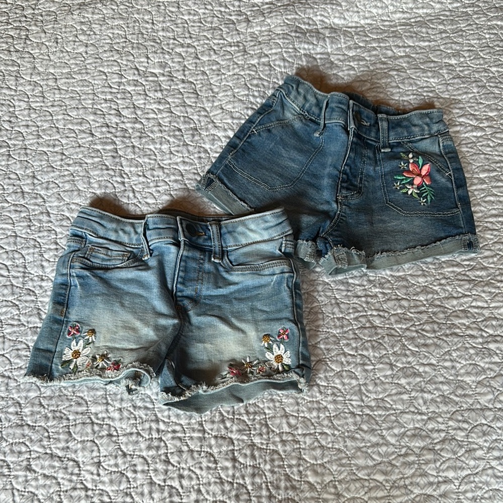 2 pairs of girls Jumping Beans Blue Distressed Shorts with Raw Hems
